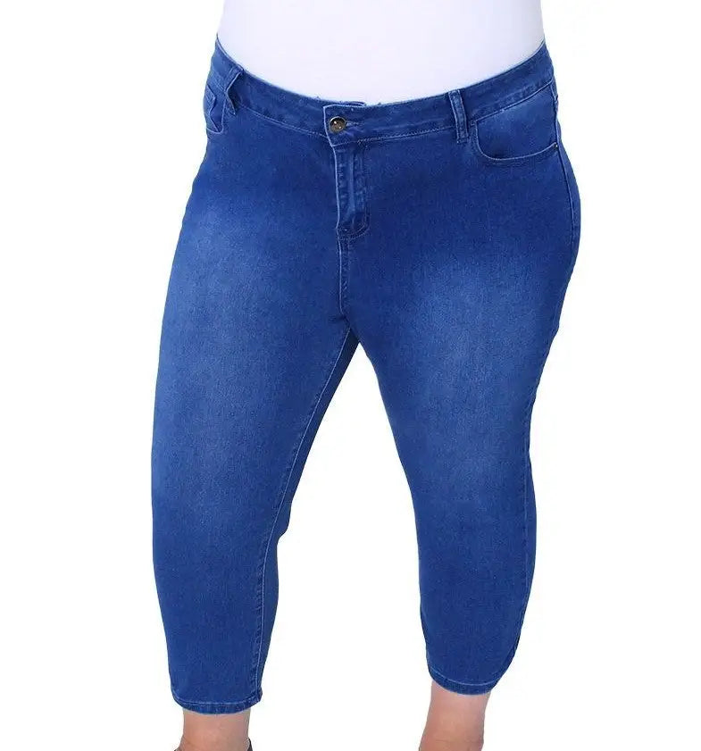 Ladies Denim Myra Capri featuring a fitted waist and chic blue denim design