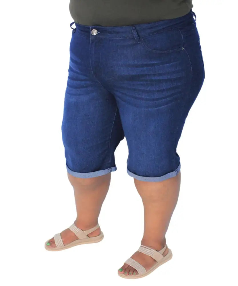 Pair of blue denim Ladies Erin Bermuda shorts styled with sandals for summer fashion
