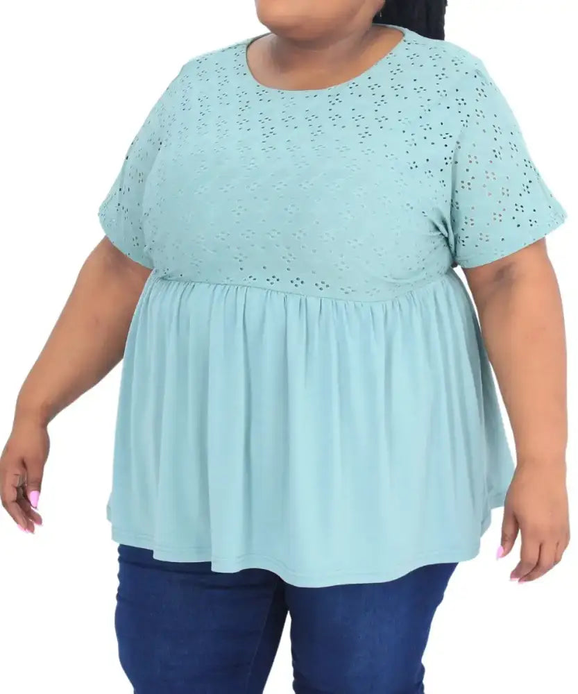 Light blue peplum-style top with eyelet detailing from Ladies Plain Crochet collection
