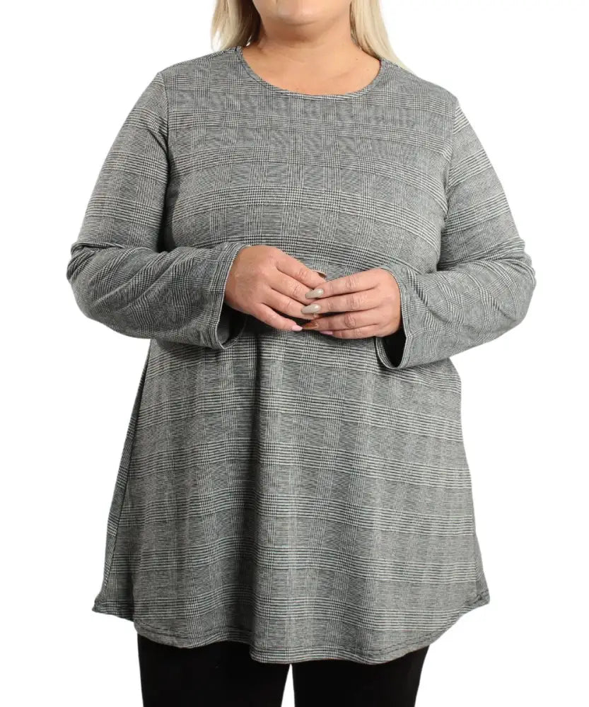 Gray long-sleeved longer length tunic featuring a relaxed fit for ladies
