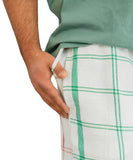 Mens Braai Shorts in green and white plaid pattern for stylish summer wear
