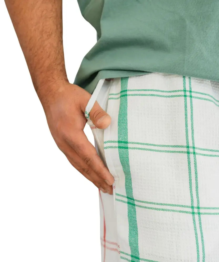 Mens Braai Shorts in green and white plaid pattern for stylish summer wear